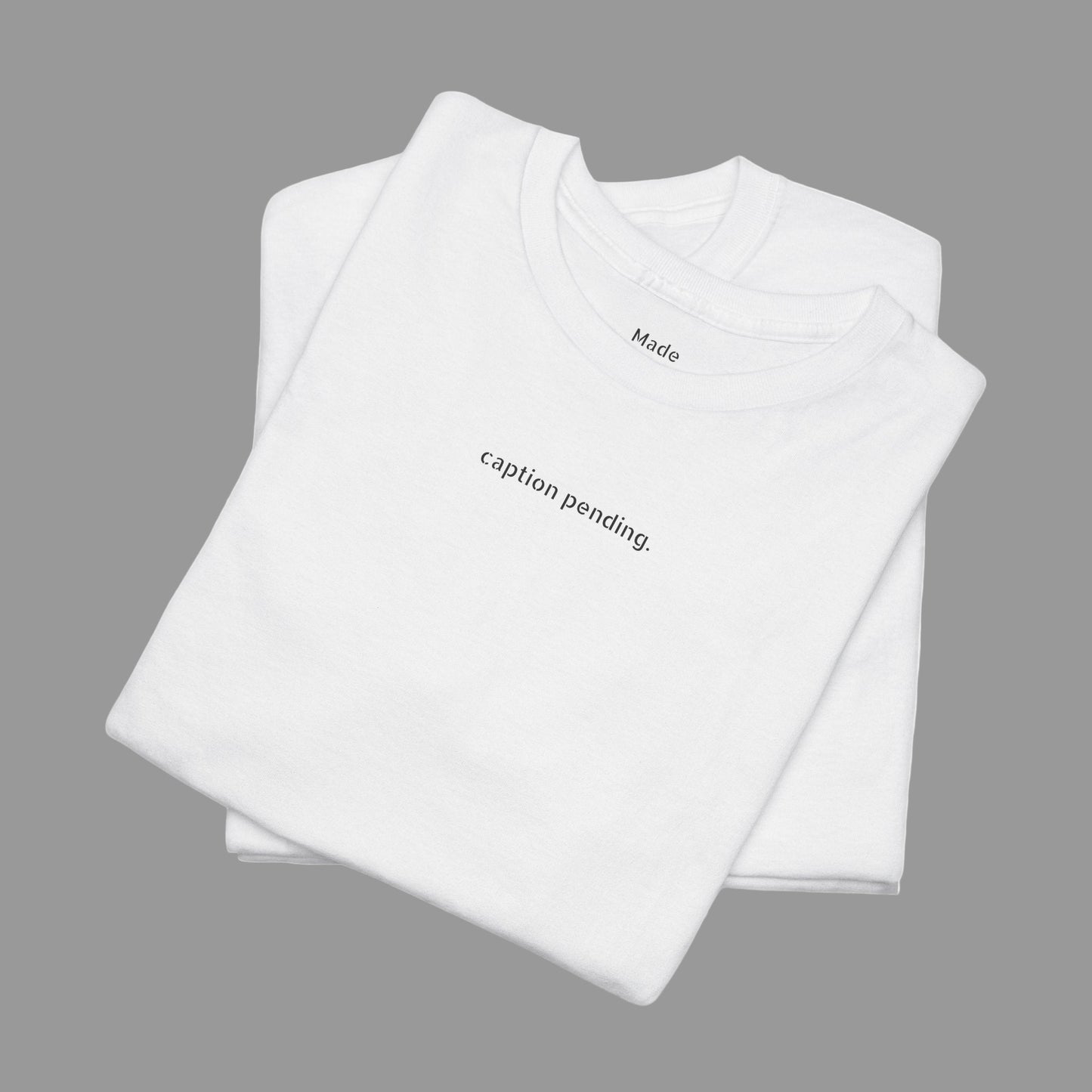 Shirt 'caption pending.' Statement